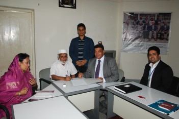 MoU signing between Bradford College and Bangladesh University.